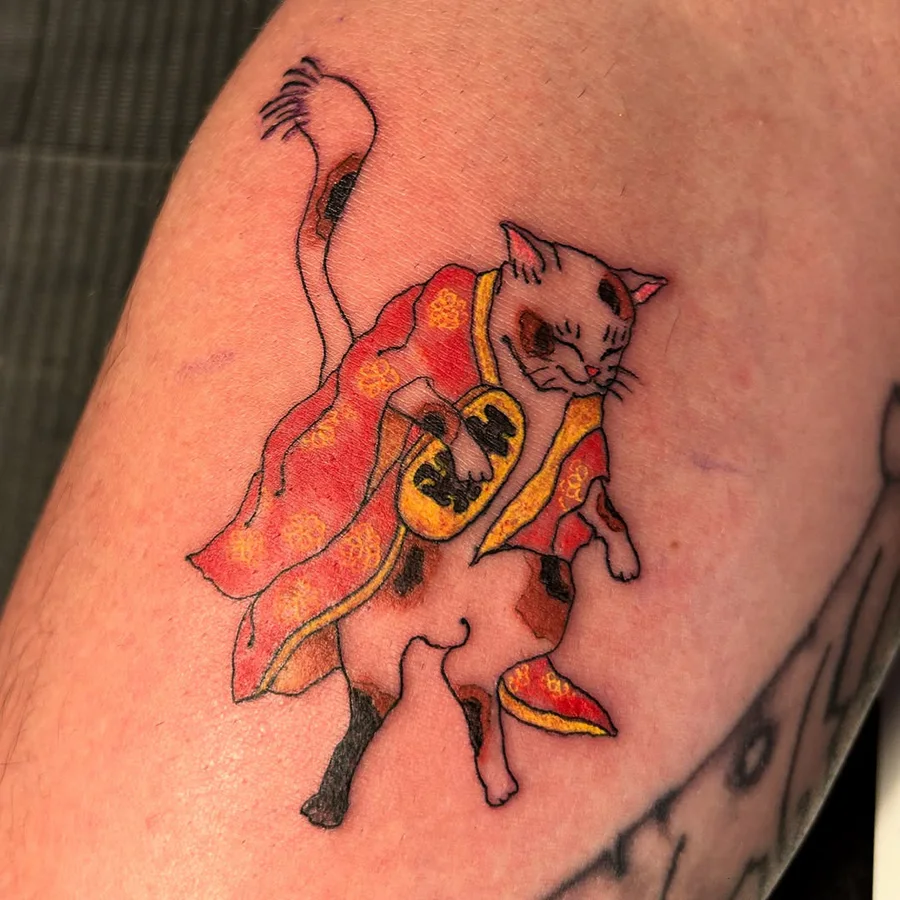 Oriental lucky cat tattoo by Tina Lu