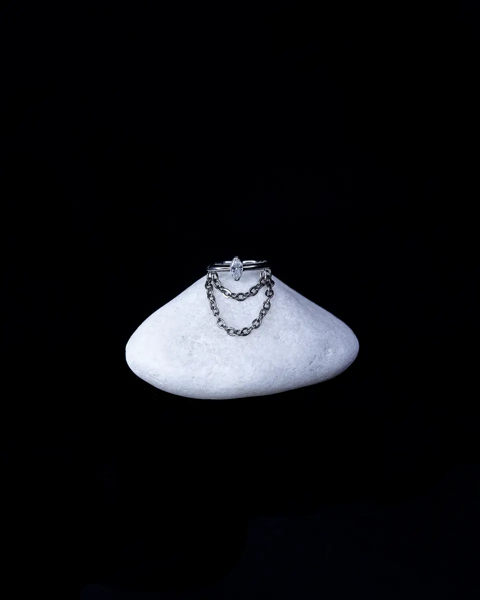 Chain and stone piercing jewelry in Lisbon