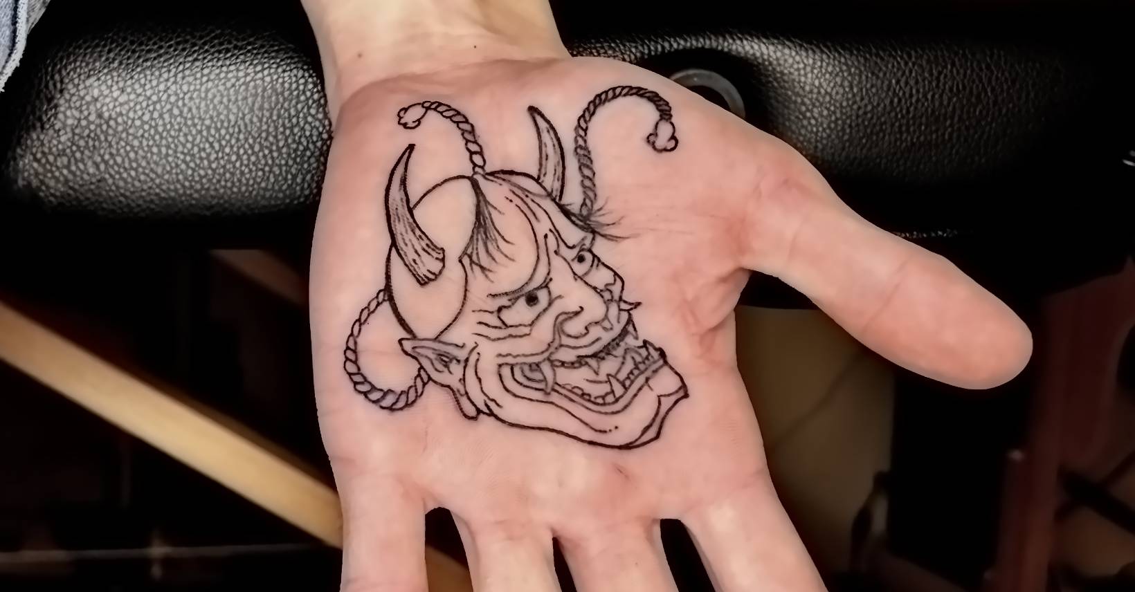 Hannya palm tattoo in Lisbon