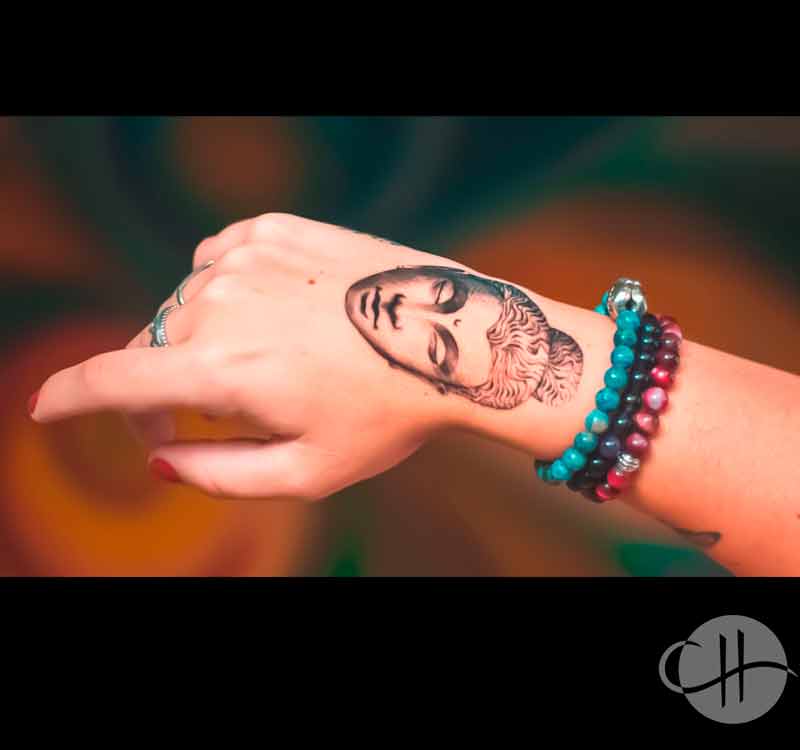 Minimal Buddha tattoo by Choco in Lisbon