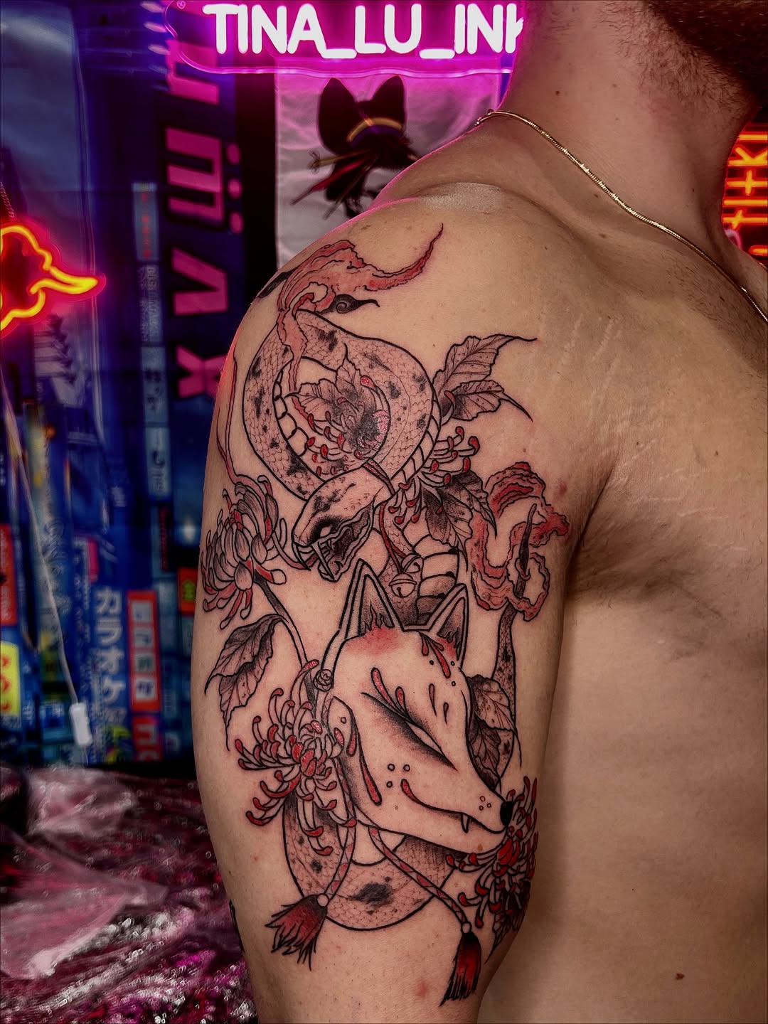 Oriental snake and mask tattoo in Lisbon